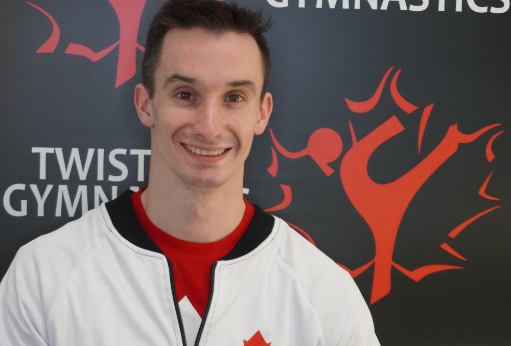 Twisters Zach headshot white jacket